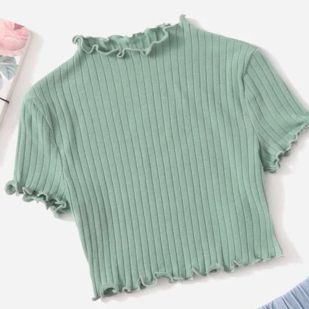 Green turtle neck cropped top.